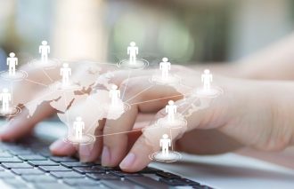 it consulting service - Hands with laptop and virtual world map
